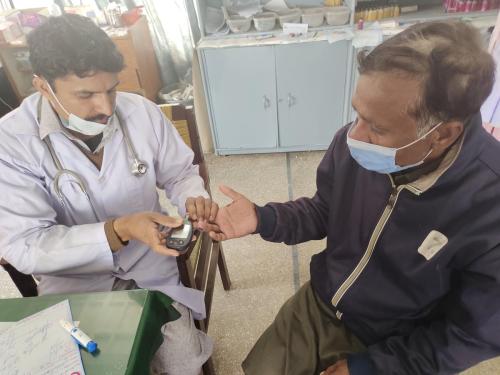 SUGAR TEST BEING CONDUCTED ON A PATIENT